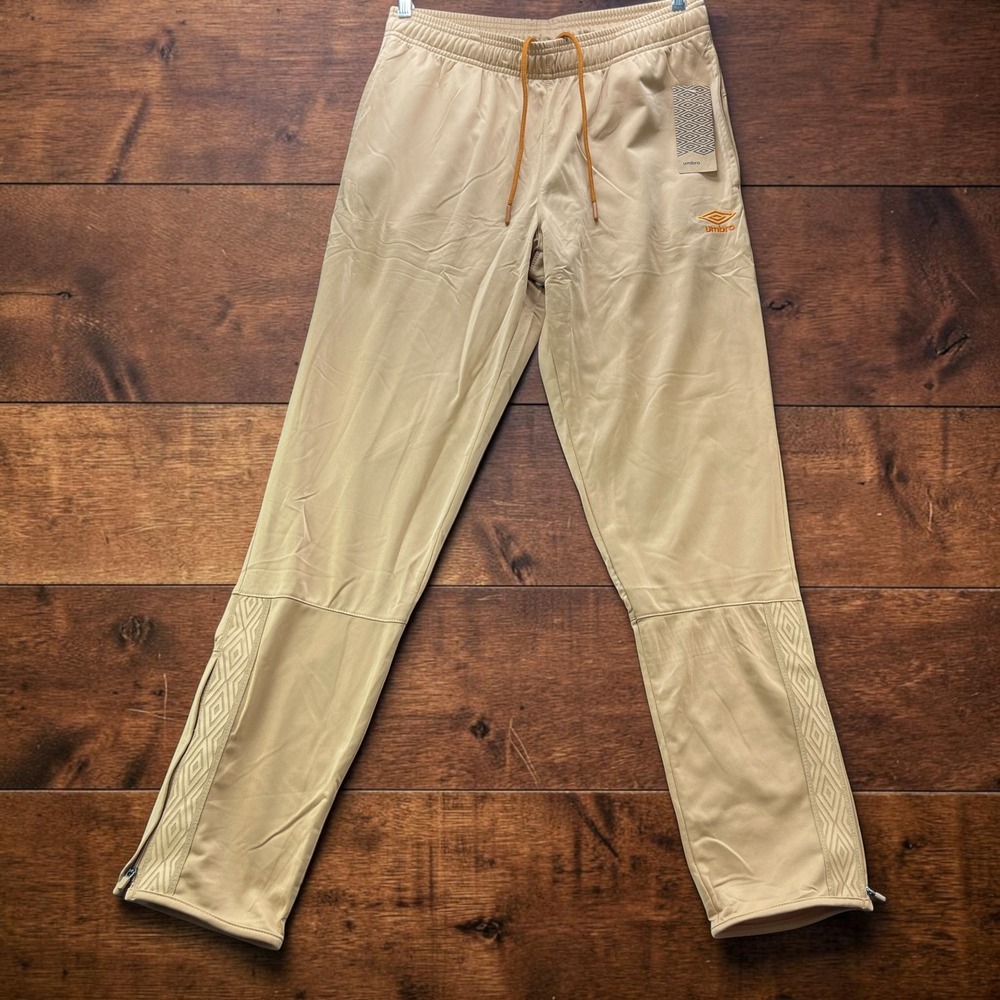 NEW Umbro Mens Tan Soccer Training Pants Logo Tape Zip Ankle Joggers (M) 32x32